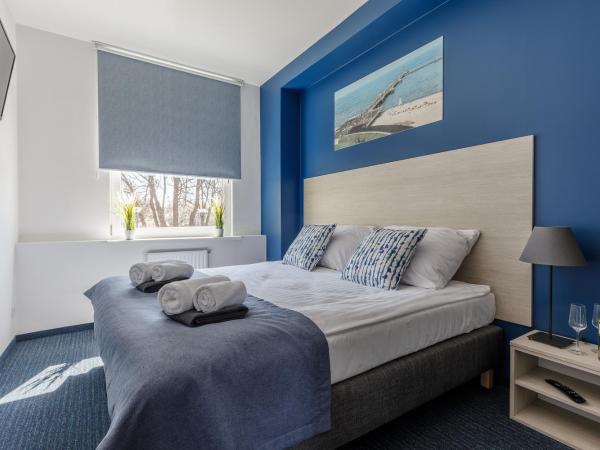 AQUA HOUSE : photo 9 de la chambre chambre double ou lits jumeaux avec salle de bains privative