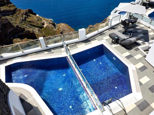 Petit Palace Suites : photo 3 de la chambre petite maison avec piscine privée chauffée - vue sur caldeira