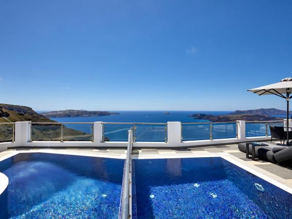 Petit Palace Suites : photo 5 de la chambre petite maison avec piscine privée chauffée - vue sur caldeira