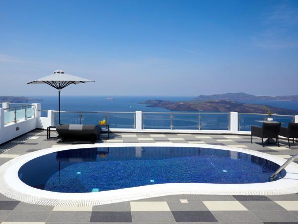 Petit Palace Suites : photo 9 de la chambre petite maison avec piscine privée chauffée - vue sur caldeira