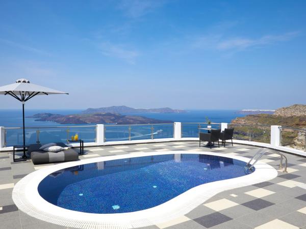 Petit Palace Suites : photo 4 de la chambre petite maison avec piscine privée chauffée - vue sur caldeira