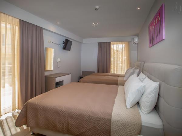 Irini Hotel : photo 1 de la chambre chambre deluxe avec 2 lits queen-size