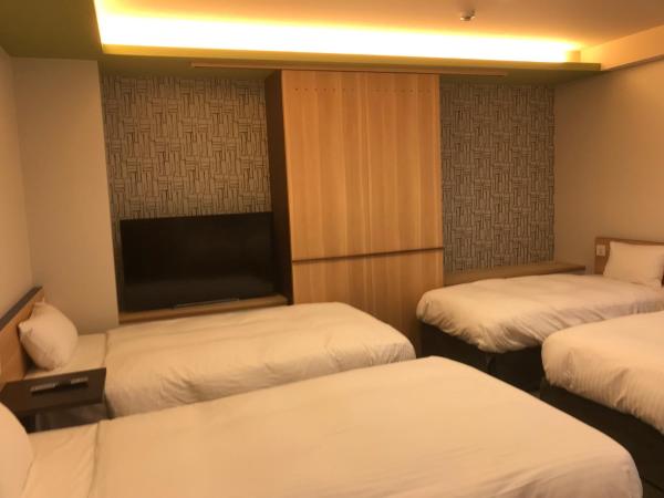 Hotel Yururito Osaka : photo 8 de la chambre chambre quadruple avec baignoire