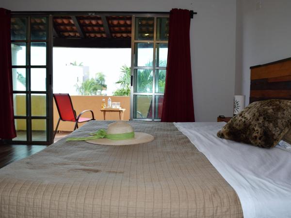 Cancun-Soho : photo 1 de la chambre suite lit queen-size - vue sur piscine