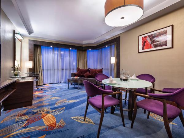 Novotel Beijing Peace : photo 3 de la chambre suite lit king-size premier