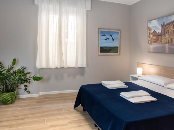 La Nuova Corte Rooms : photo 1 de la chambre chambre quadruple avec terrasse