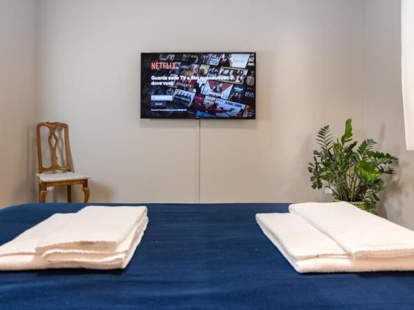 La Nuova Corte Rooms : photo 3 de la chambre chambre quadruple avec terrasse