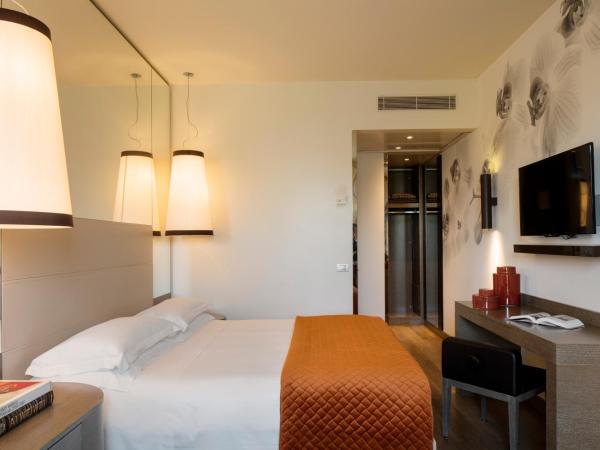 Starhotels Echo : photo 1 de la chambre chambre deluxe double ou lits jumeaux