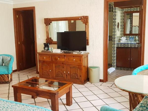 Hotel Posada Quinta Las Flores : photo 10 de la chambre suite lit king-size