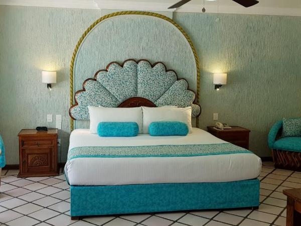 Hotel Posada Quinta Las Flores : photo 2 de la chambre suite lit king-size