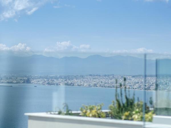 Messinian Icon Hotel & Suites : photo 7 de la chambre chambre double ou lits jumeaux standard - vue sur mer
