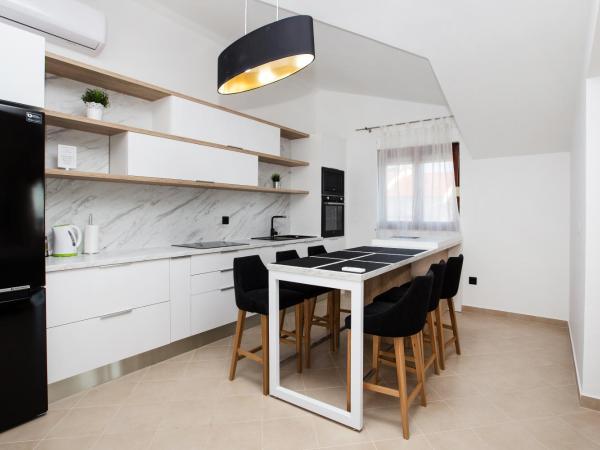 Villa M : photo 3 de la chambre penthouse