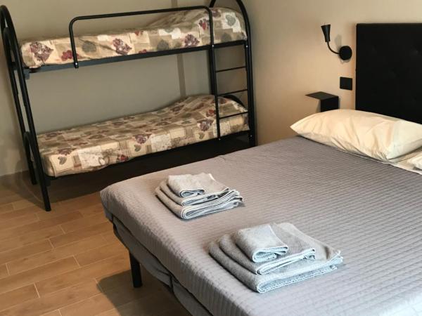 Riva Reno 4 Rooms : photo 3 de la chambre chambre quadruple