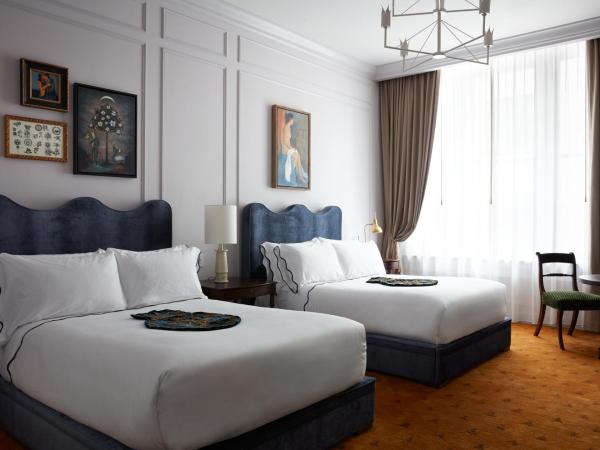 Maison Metier : photo 1 de la chambre chambre double avec 2 lits doubles