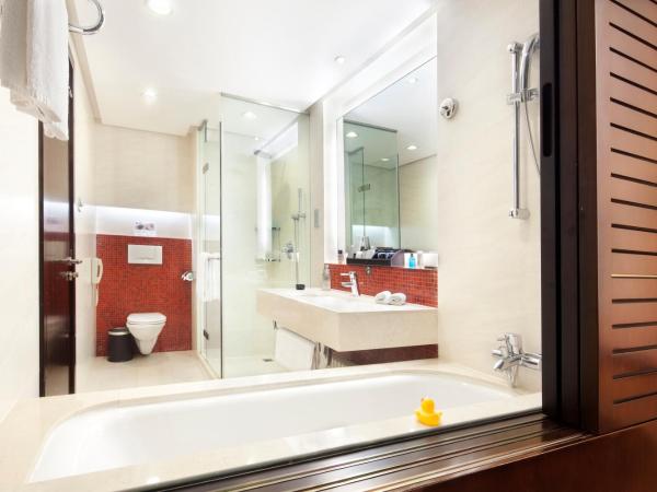 Howard Johnson Parkland Hotel Dalian : photo 3 de la chambre howard court junior suite a