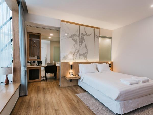 Artino Hotel Silom : photo 3 de la chambre chambre double deluxe - vue sur ville