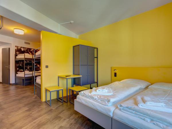 MEININGER Hotel München Olympiapark : photo 4 de la chambre hébergement 6 lits