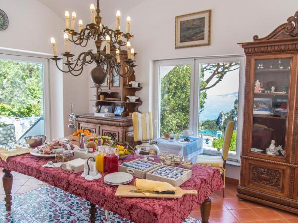 Suite Villa Carolina : photo 1 de la chambre chambre double avec terrasse