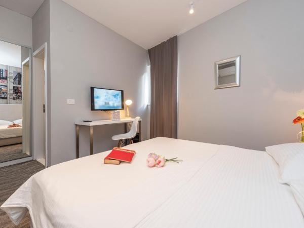 Downtown Boutique Hostel : photo 9 de la chambre chambre double ou lits jumeaux supérieure