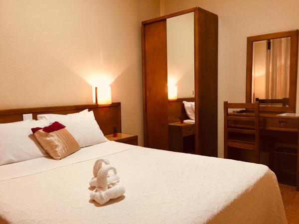 Hotel Portinari : photo 3 de la chambre chambre double