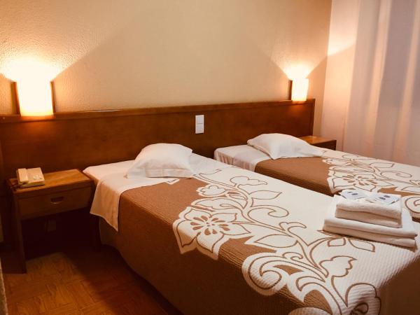 Hotel Portinari : photo 2 de la chambre chambre lits jumeaux