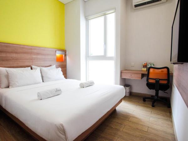 LeGreen Suite Kuningan : photo 1 de la chambre chambre double supérieure
