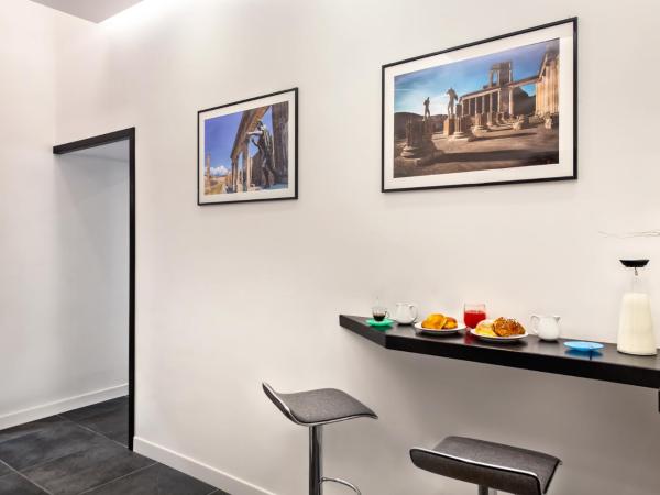 Carten : photo 8 de la chambre chambre lit king-size dépendance avec baignoire spa et sauna