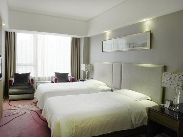 La Perle International Hotel - Free shuttle between hotel and Exhibition Center during Canton Fair & Exhibitor registration Counter : photo 3 de la chambre chambre lits jumeaux confort