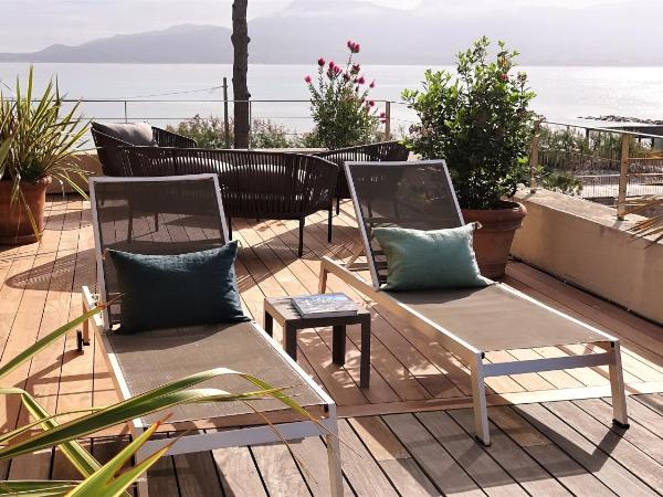 Hôtel La Caravelle : photo 4 de la chambre suite avec terrasse - vue sur mer et citadelle
