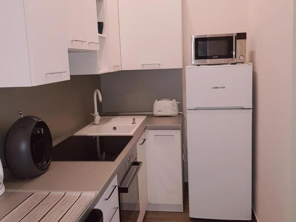 Classic Apartman : photo 4 de la chambre chambre triple avec salle de bains privative