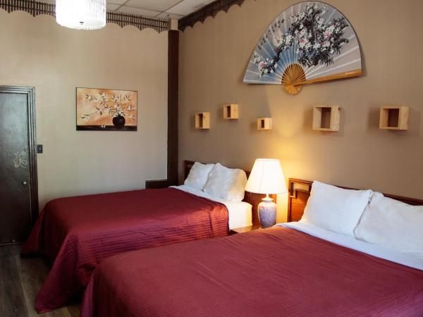 Hotel Casa Bella : photo 1 de la chambre chambre avec 2 grands lits queen-size