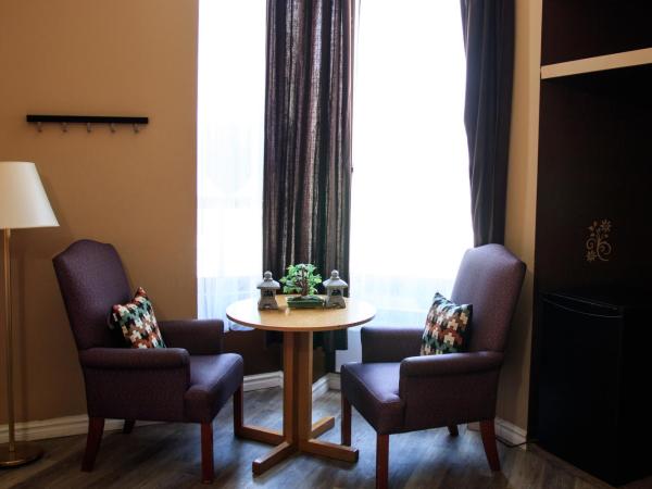 Hotel Casa Bella : photo 3 de la chambre chambre avec 2 grands lits queen-size