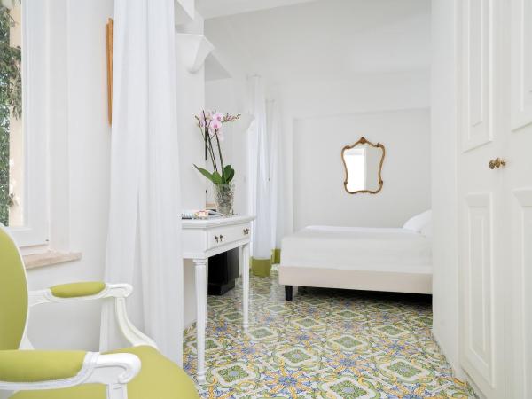 Sina Flora : photo 6 de la chambre chambre lit queen-size