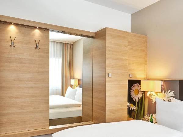 H+ Hotel Zürich : photo 1 de la chambre chambre lit queen-size confort