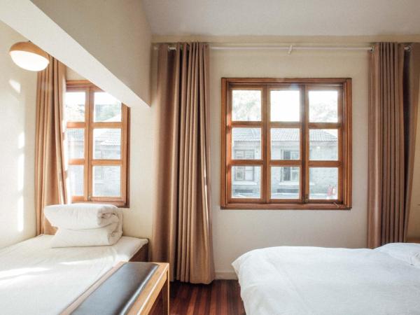 Lao men dong International Youth Hostel : photo 1 de la chambre chambre familiale