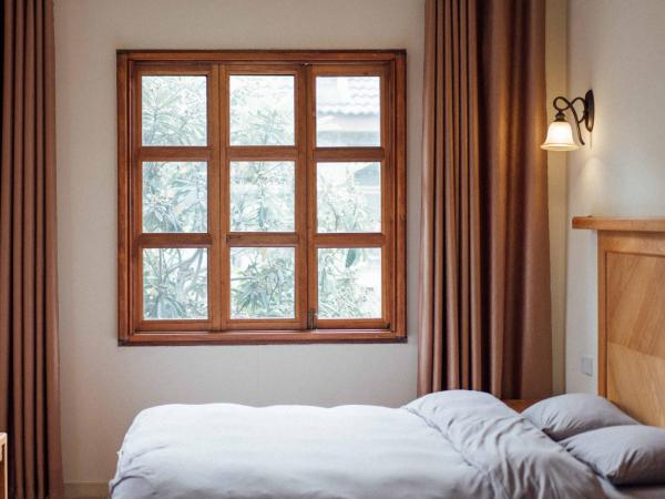 Lao men dong International Youth Hostel : photo 3 de la chambre chambre double