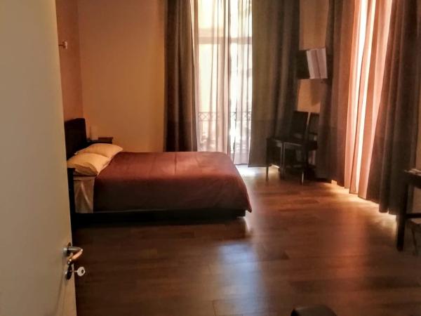 B&B PETER PAN : photo 9 de la chambre suite lit king-size avec balcon