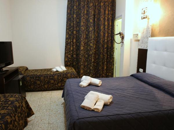 Hotel Busignani : photo 1 de la chambre chambre quadruple