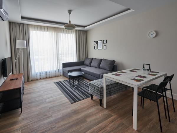 Lara Suite's Apart Hotel : photo 8 de la chambre suite - vue sur jardin