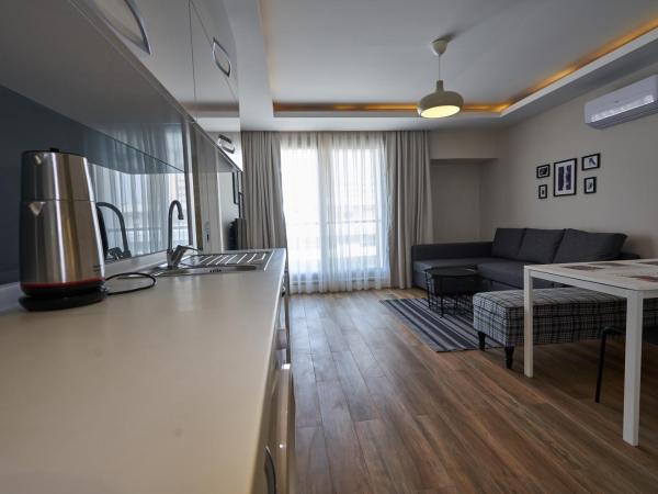 Lara Suite's Apart Hotel : photo 7 de la chambre suite - vue sur jardin