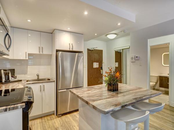 Town Inn Suites Hotel : photo 7 de la chambre suite deluxe avec lit king-size