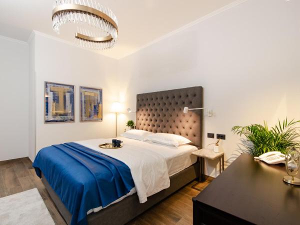 Villa Brandestini : photo 8 de la chambre chambre lit king-size supérieure