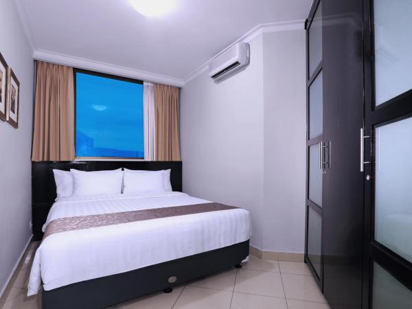 Horison Ultima Suite & Residences Rasuna Jakarta : photo 5 de la chambre suite affaires