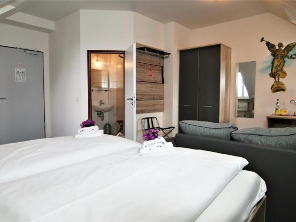 Hotel am Waldschlösschen - Brauhaus : photo 4 de la chambre chambre triple