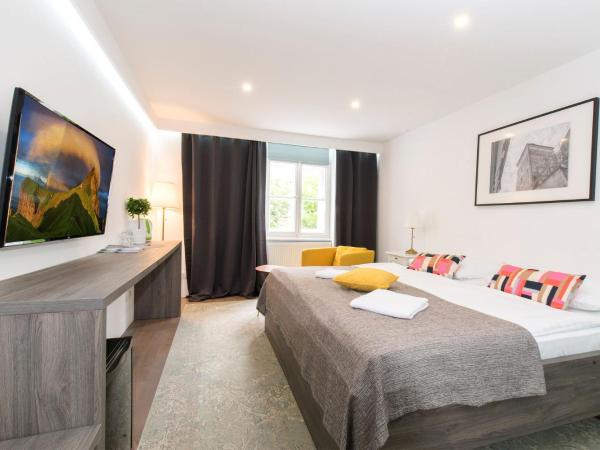 Tia Apartments and Rooms : photo 1 de la chambre chambre double ou lits jumeaux supérieure