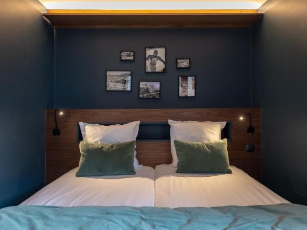 Fahrenheit Seven Courchevel : photo 6 de la chambre chambre familiale - vue sur piste de ski