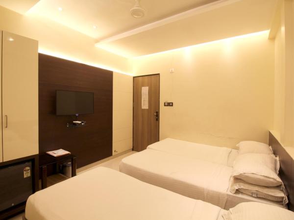 Hotel Shivam : photo 9 de la chambre triple bed non ac room