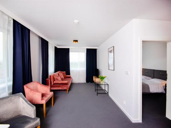 Silesia Apartments : photo 1 de la chambre apartment with a separate bedroom