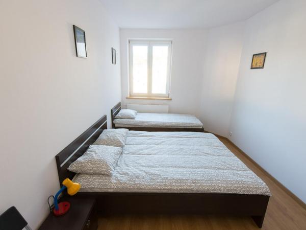 Lux Hostel - z prywatnymi łazienkami : photo 2 de la chambre chambre double ou lits jumeaux avec salle de bains privative