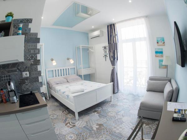 Nereidi Suites : photo 1 de la chambre chambre double deluxe avec balcon - vue sur mer
